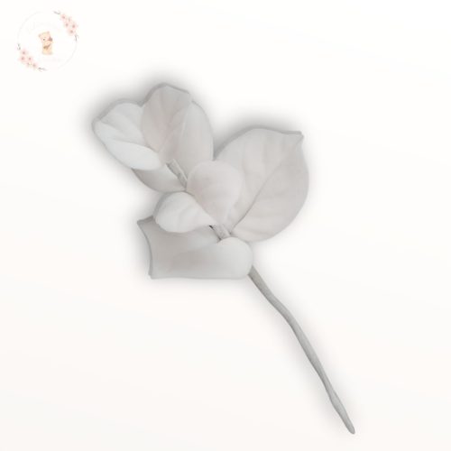 Kézműves fehér cukor eukaliptusz ág lágy pasztell árnyalatokkal.